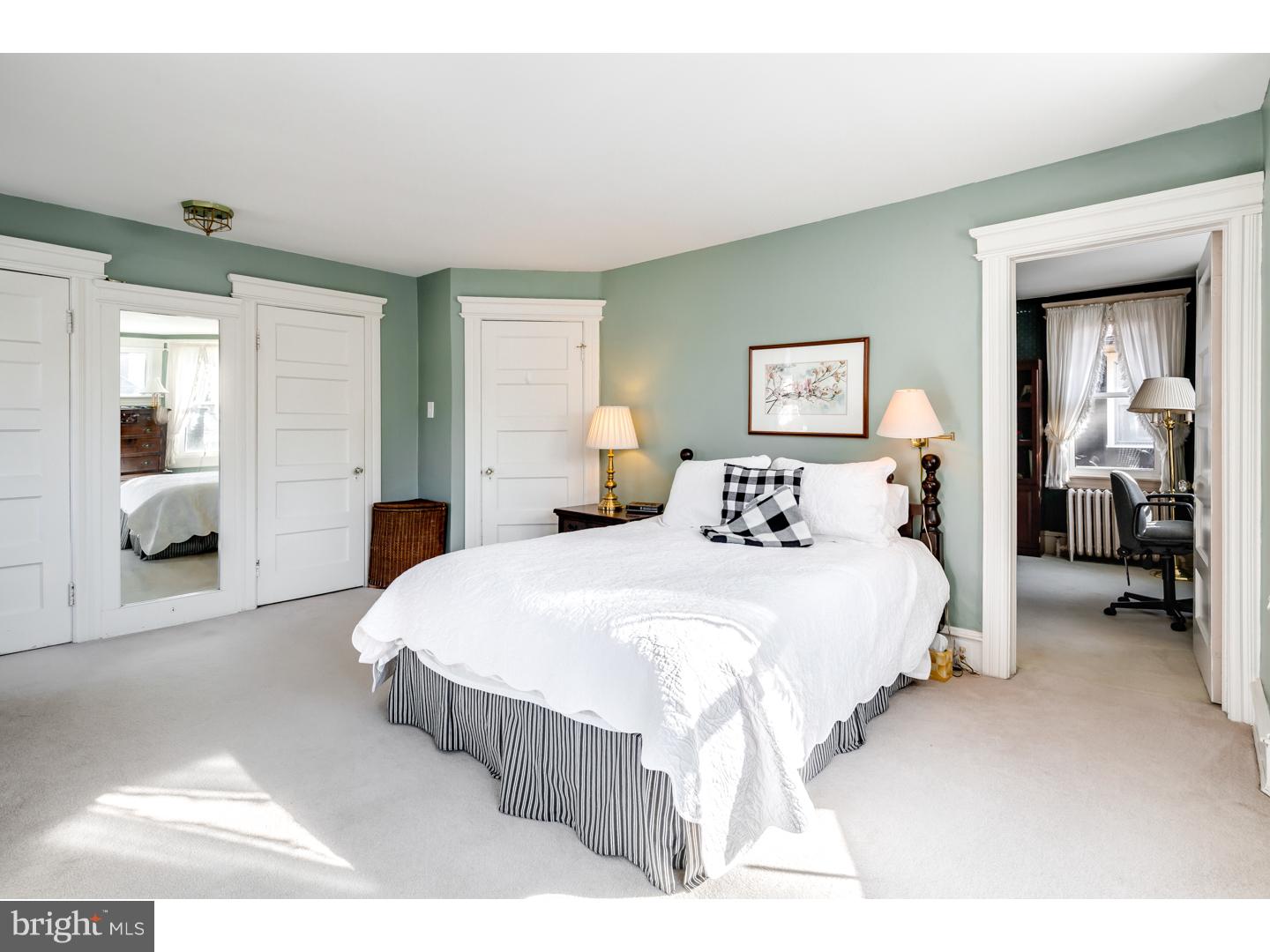 127 Lafayette Avenue Haddonfield, NJ 08033 - Photo 20 of 25 a spacious bedroom with a bed and walk in closet