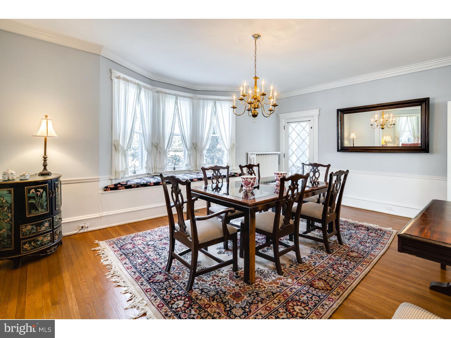 127 Lafayette Avenue Haddonfield, NJ 08033 - Photo 7 of 25 a view of a dining room with furniture and wooden floor