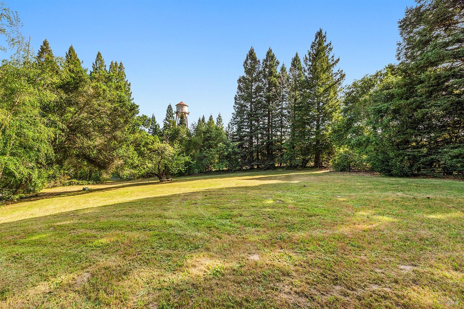 2235 Laguna Road Santa Rosa, CA 95401 - Photo 1 of 1 a view of a swimming pool with an outdoor space and seating area