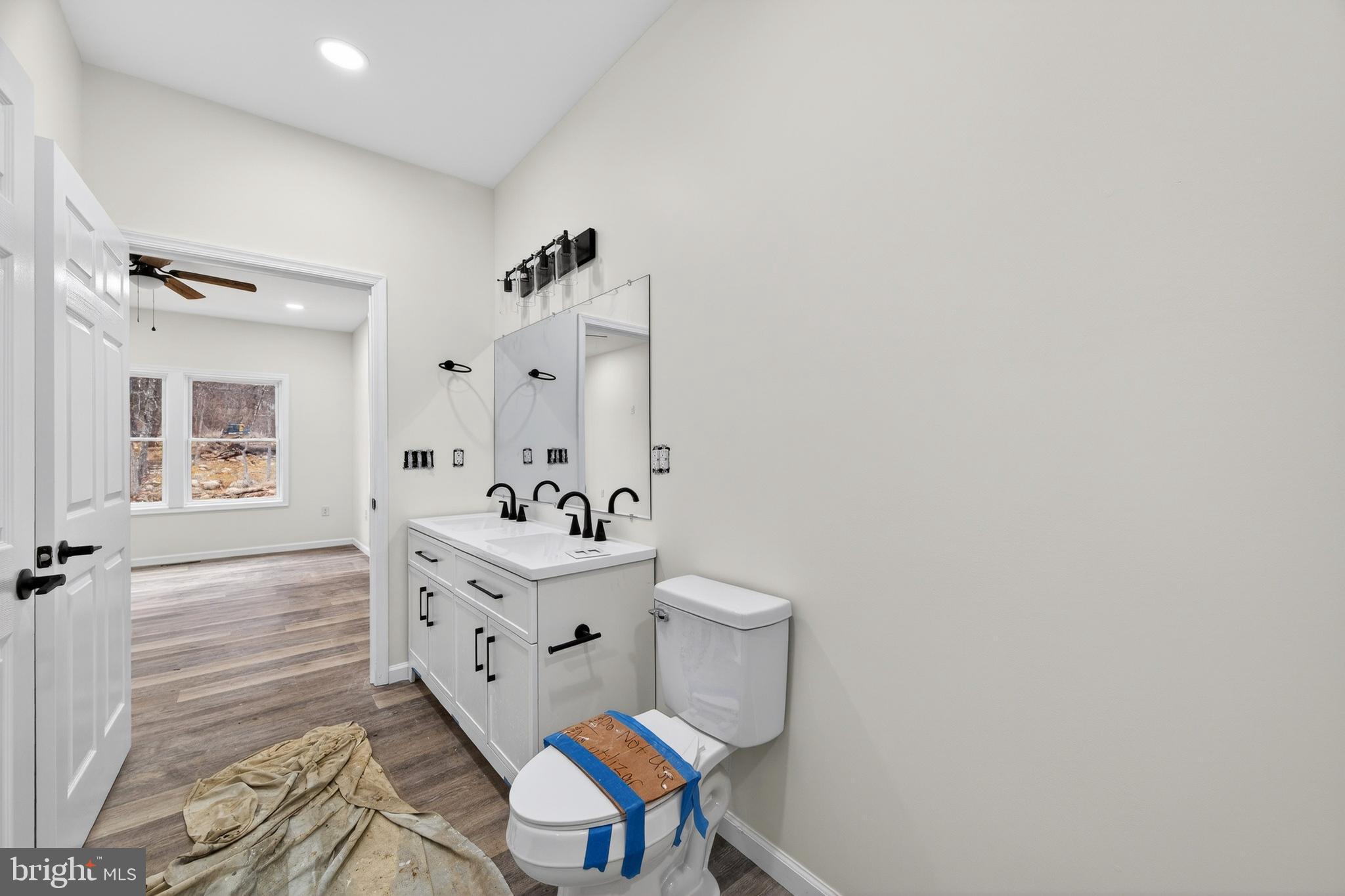 875 Buffalo Rdg Road Augusta, WV 26704 - Photo 17 of 27 a spacious bathroom with a sink toilet and shower