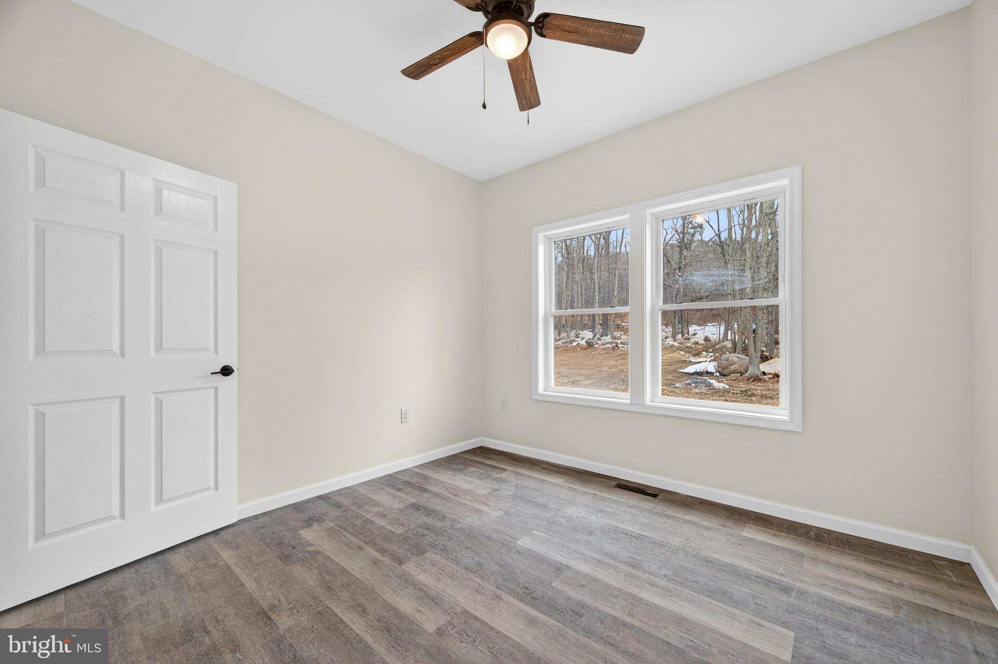 875 Buffalo Rdg Road Augusta, WV 26704 - Photo 20 of 27 a view of an empty room with a window