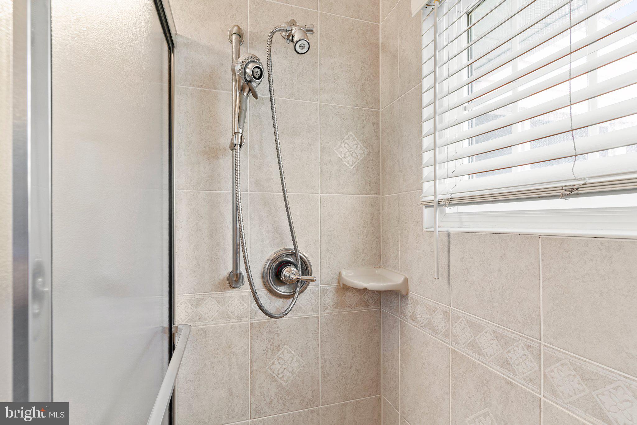 11 Trellis Road Levittown, PA 19056 - Photo 20 of 37 a bathroom with a shower