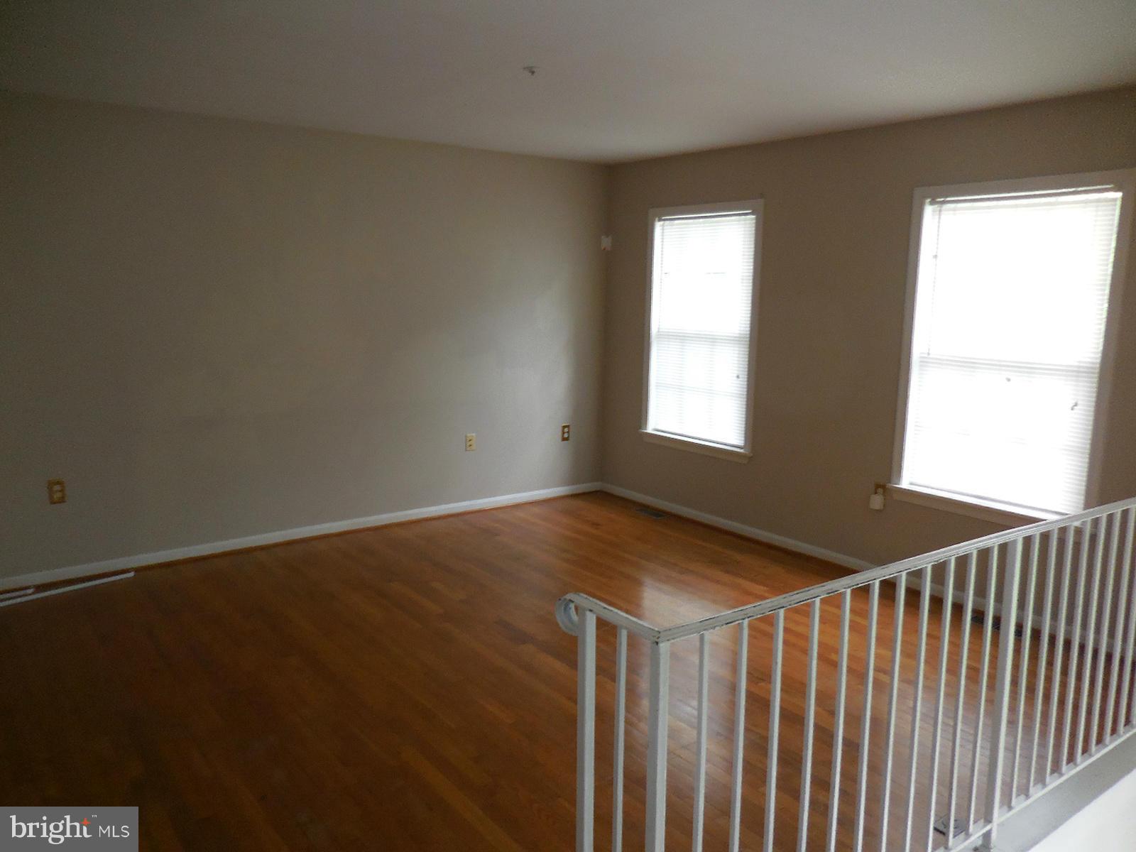 6322 Springbrook Lane Clinton, MD 20735 - Photo 3 of 9 a view of an empty room and window