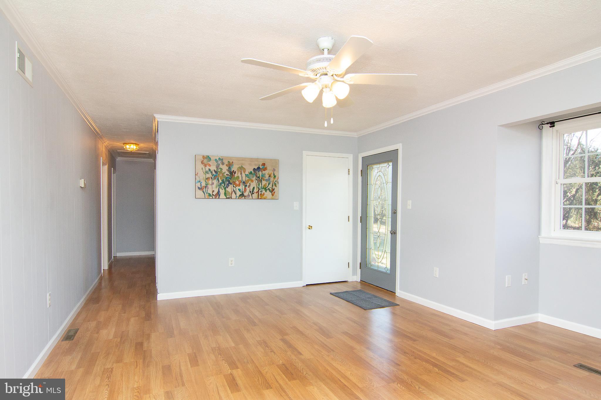 5033 Roller Road Manchester, MD 21102 - Photo 3 of 22 LAMINATE FLOORS THROUGHTOUT