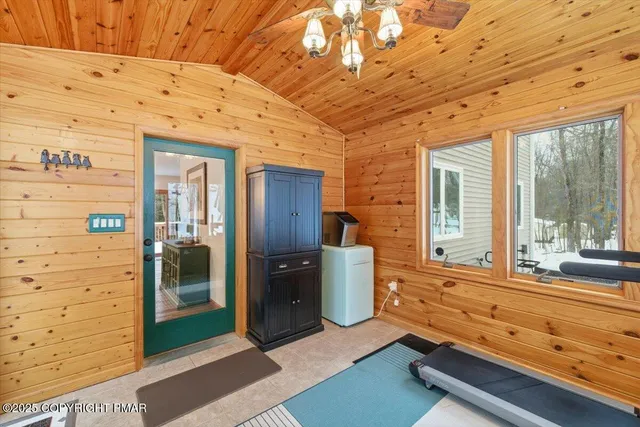 a bathroom with a granite countertop toilet a sink and a mirror