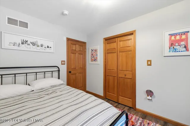 a house with trees in the background