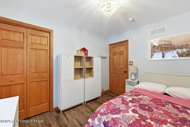 a view of a patio with iron fence