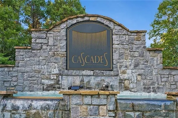 a view of a water fountain with an outdoor space