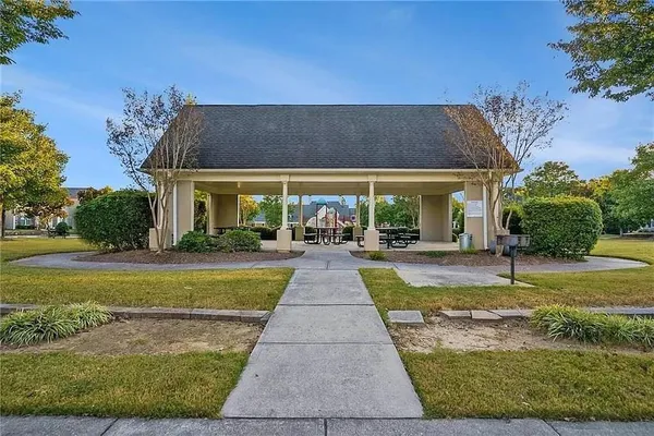 a view of swimming pool and outdoor seating