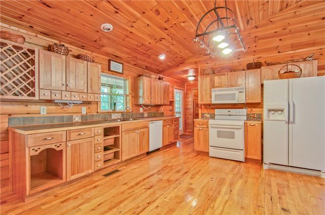 2446 Tower Road Nunnelly, TN 37137 - Photo 5 of 20 Open kitchen with access to covered back porch and pantry.