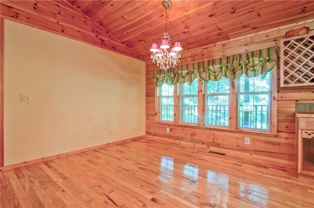 2446 Tower Road Nunnelly, TN 37137 - Photo 7 of 20 Breakfast room that overlooks back yard, woods and covered back deck.