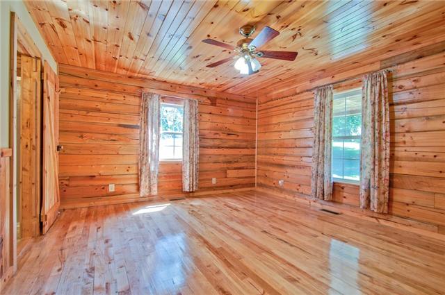 2446 Tower Road Nunnelly, TN 37137 - Photo 8 of 20 Master bedroom. The master bedroom also has a nice walk-in closet.