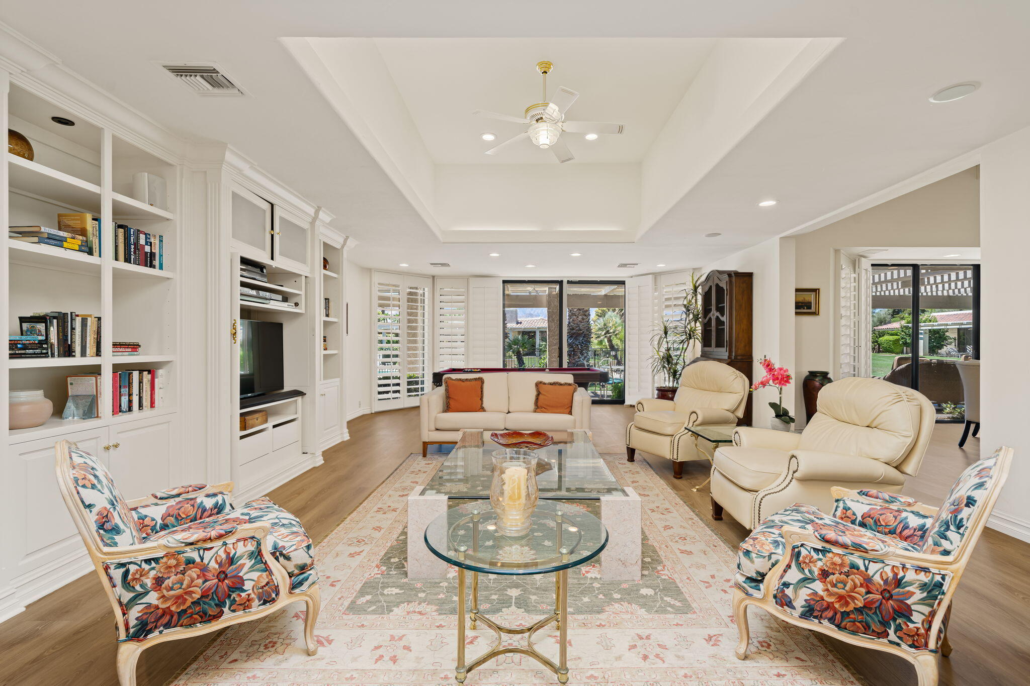 5 Stanford Drive Rancho Mirage, CA 92270 - Photo 11 of 53 a living room with furniture and a flat screen tv