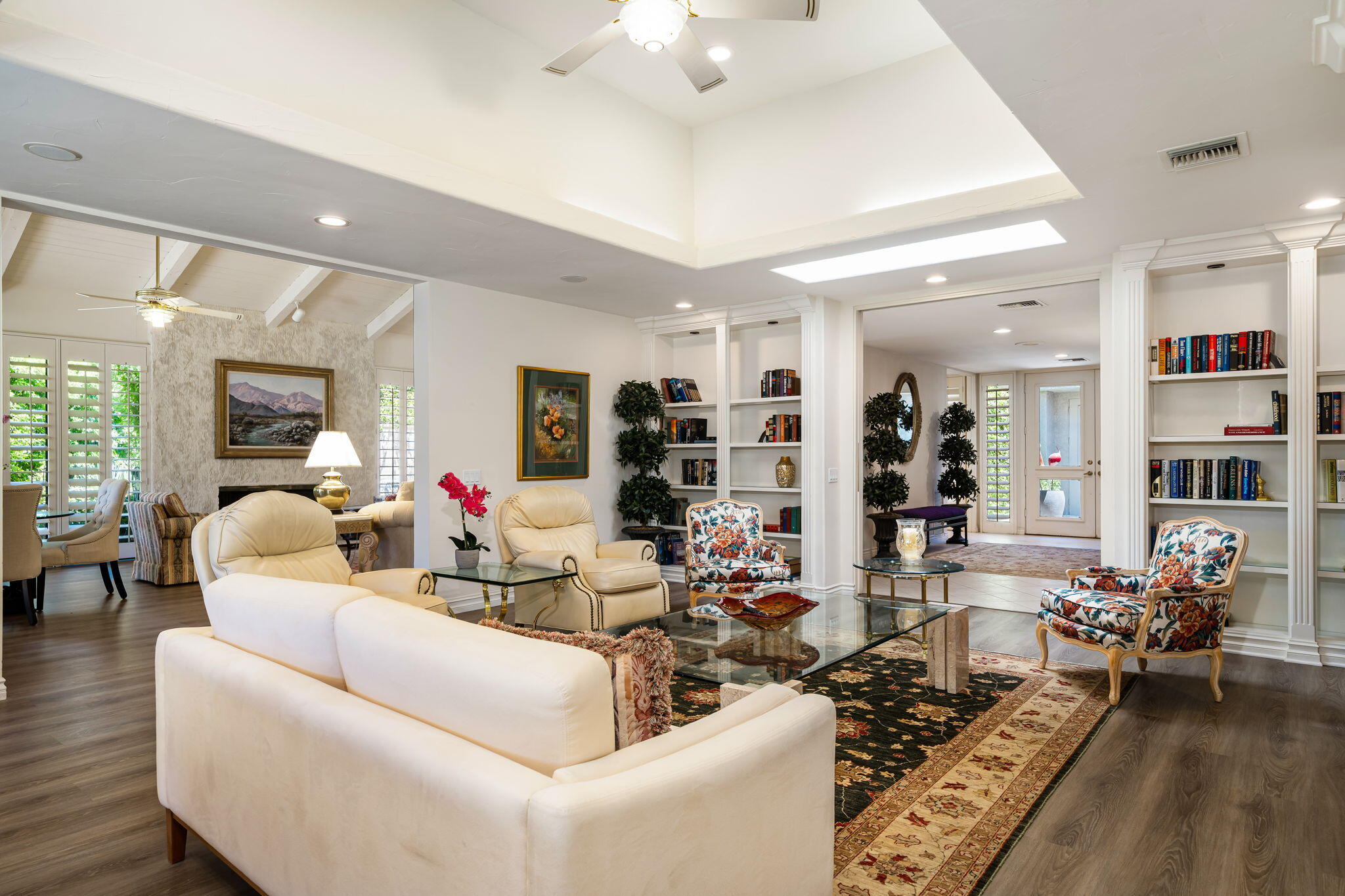 5 Stanford Drive Rancho Mirage, CA 92270 - Photo 15 of 53 a living room with furniture and a wooden floor
