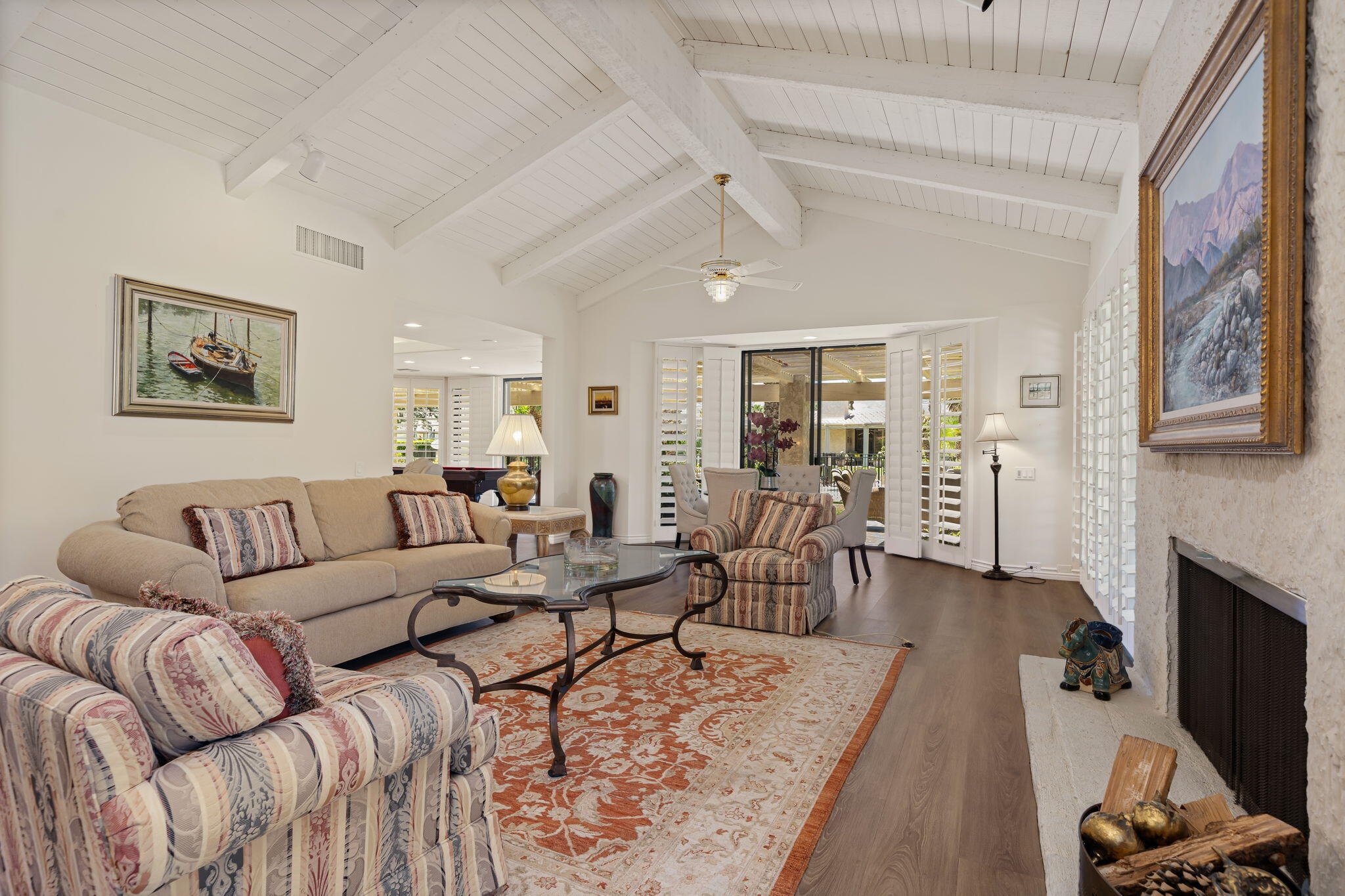 5 Stanford Drive Rancho Mirage, CA 92270 - Photo 19 of 53 a living room with furniture or couch and a fireplace