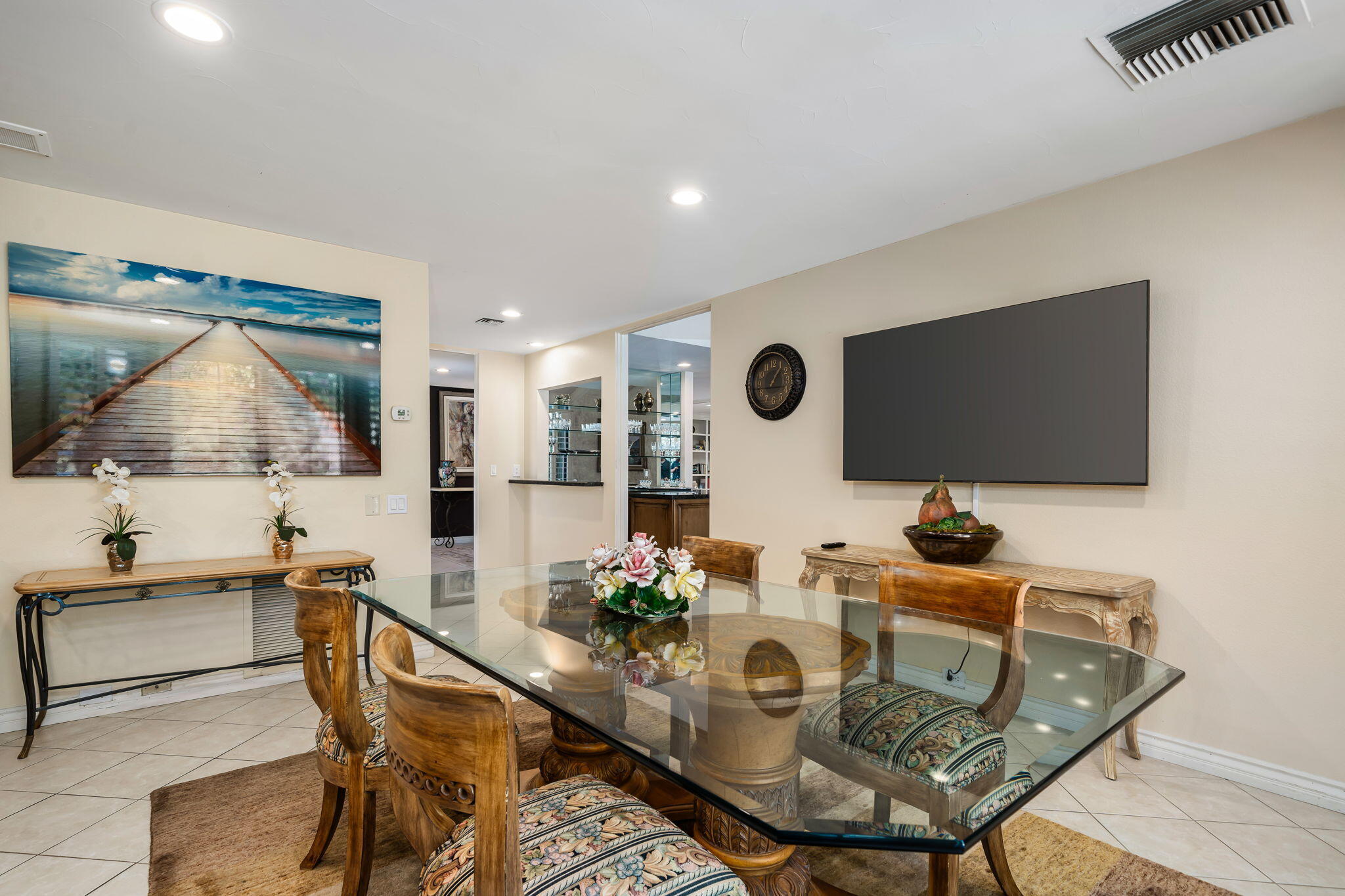 5 Stanford Drive Rancho Mirage, CA 92270 - Photo 24 of 53 a living room with furniture and a flat screen tv