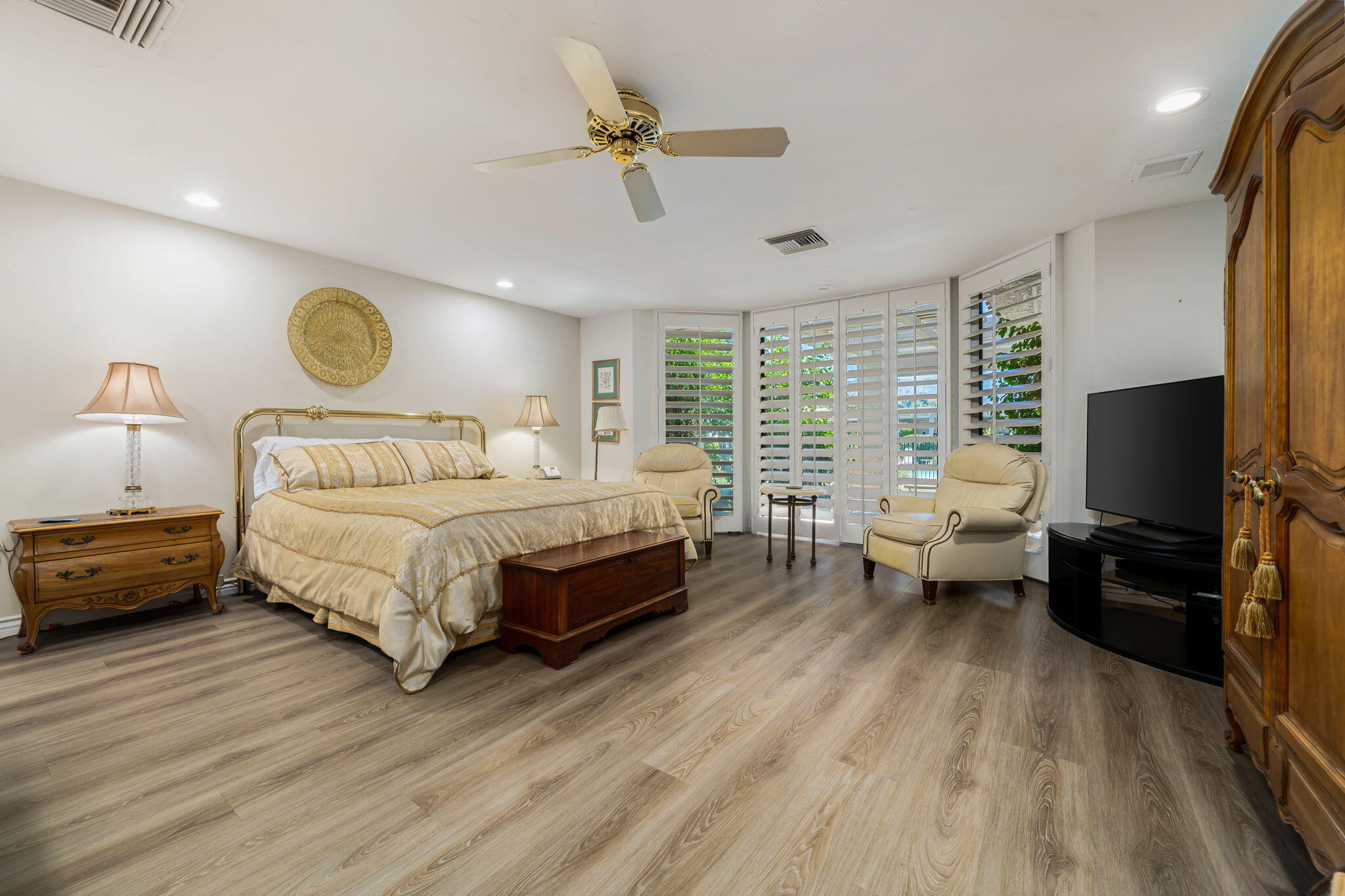 5 Stanford Drive Rancho Mirage, CA 92270 - Photo 43 of 53 a bedroom with a bed and window