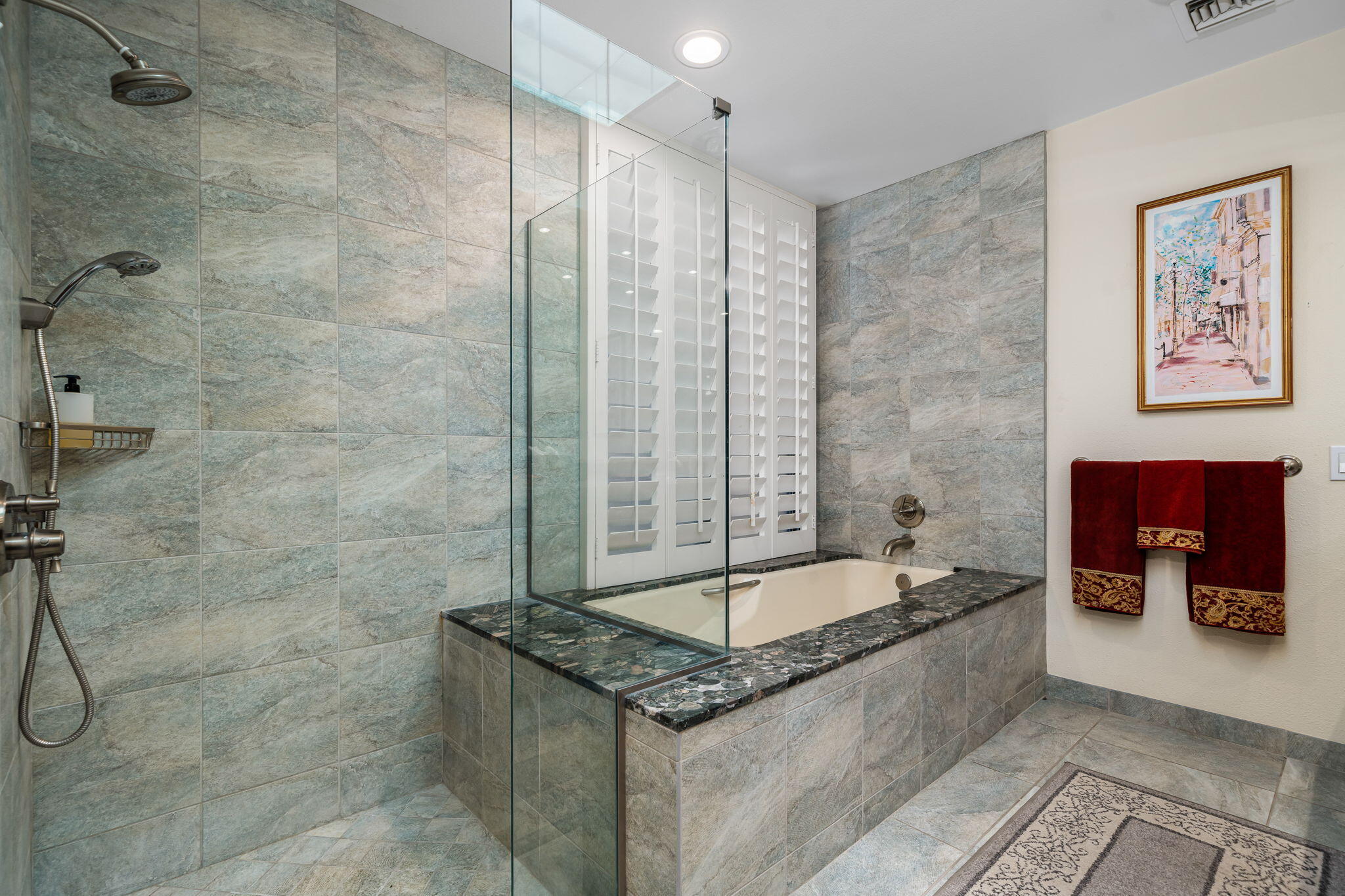 5 Stanford Drive Rancho Mirage, CA 92270 - Photo 47 of 53 a bathroom with a granite countertop bathtub and shower