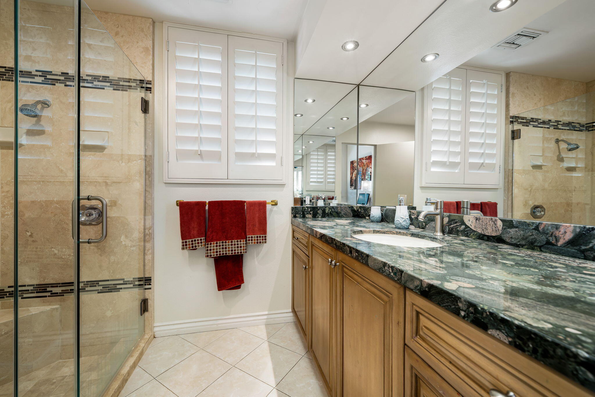 5 Stanford Drive Rancho Mirage, CA 92270 - Photo 52 of 53 a bathroom with a granite countertop sink mirror and toilet