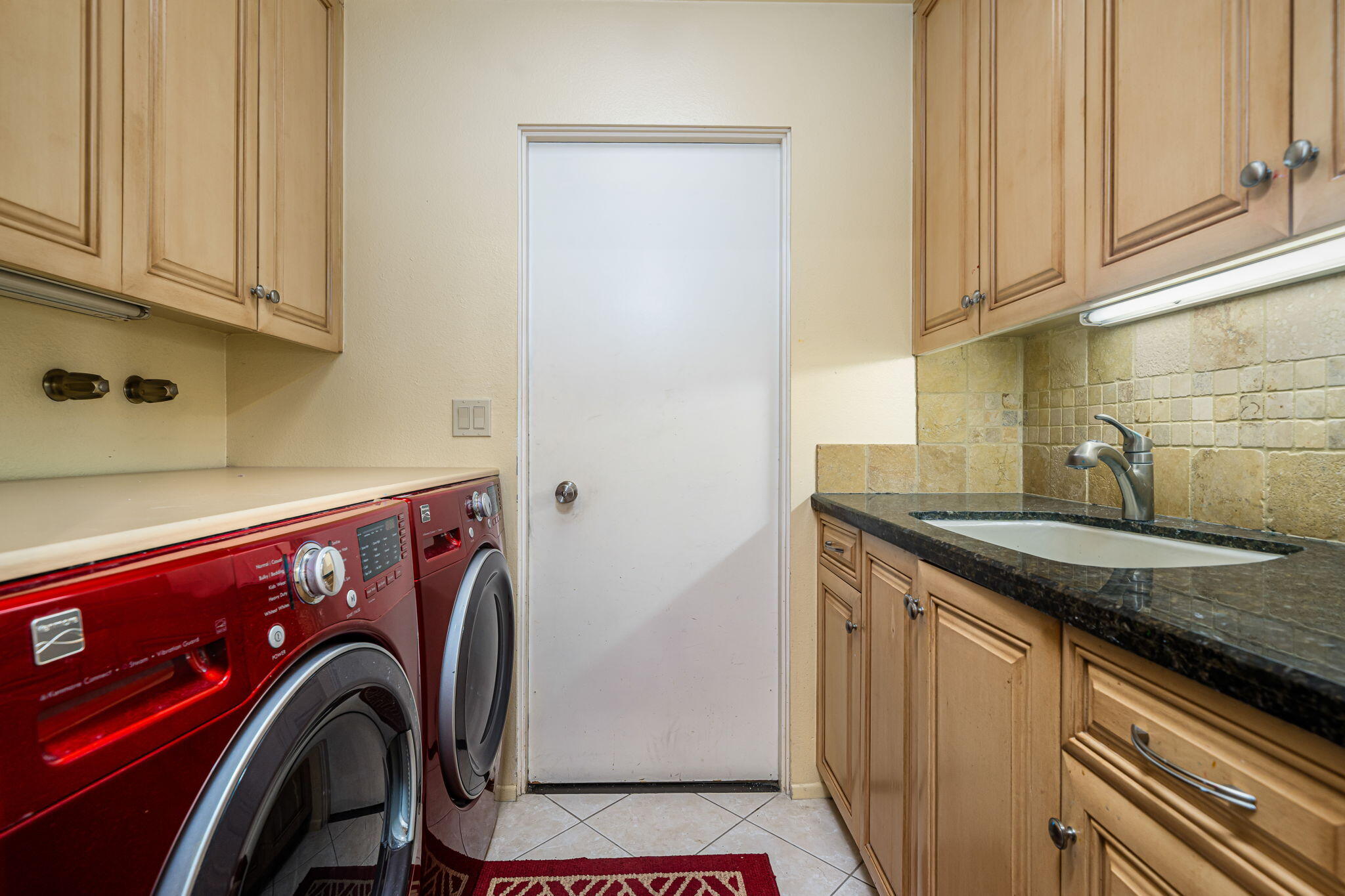 5 Stanford Drive Rancho Mirage, CA 92270 - Photo 53 of 53 a utility room with dryer and washer