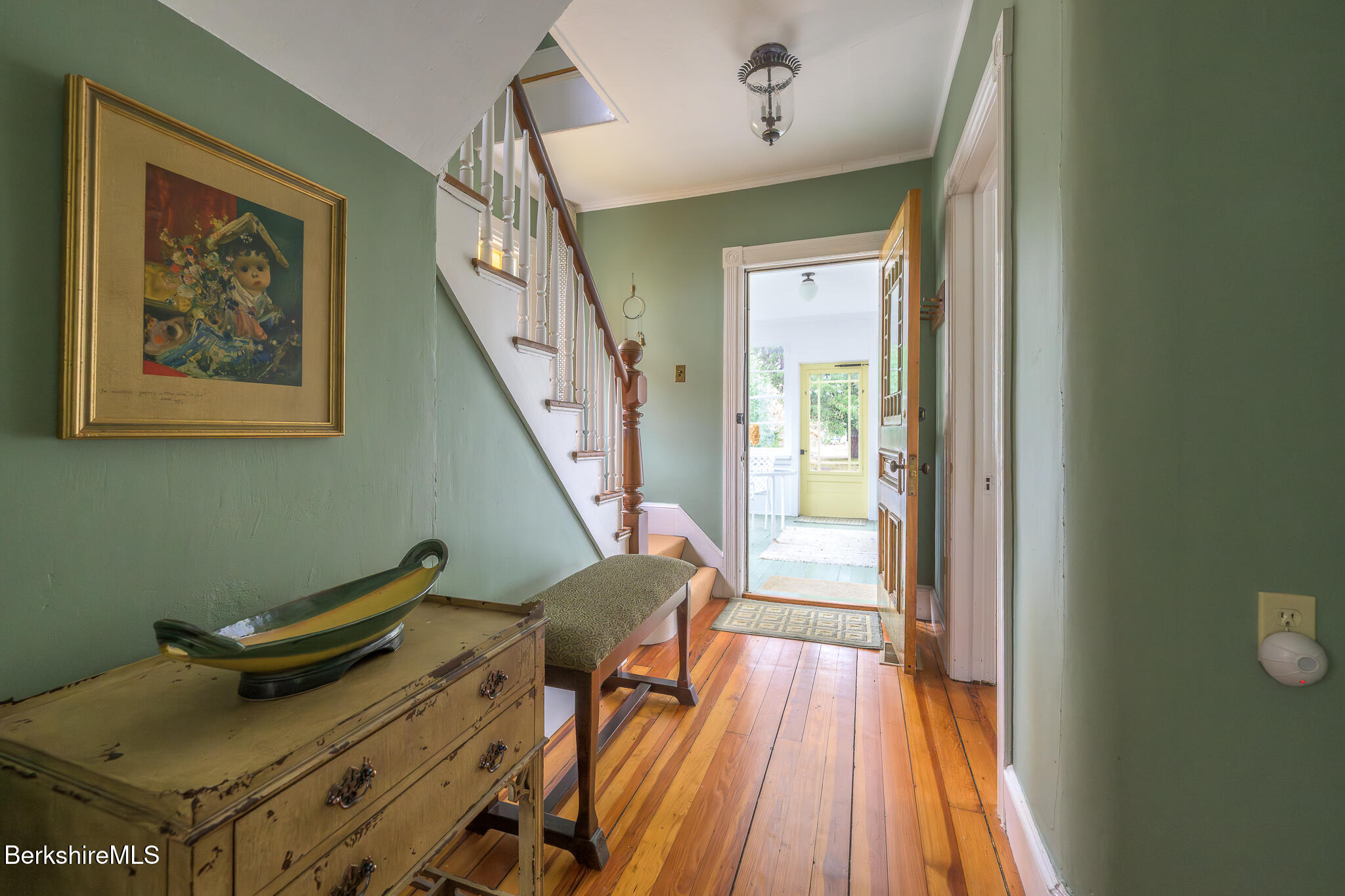 11 Sergeant Street Stockbridge, MA 01262 - Photo 25 of 52 a view of a room with furniture and wooden floor