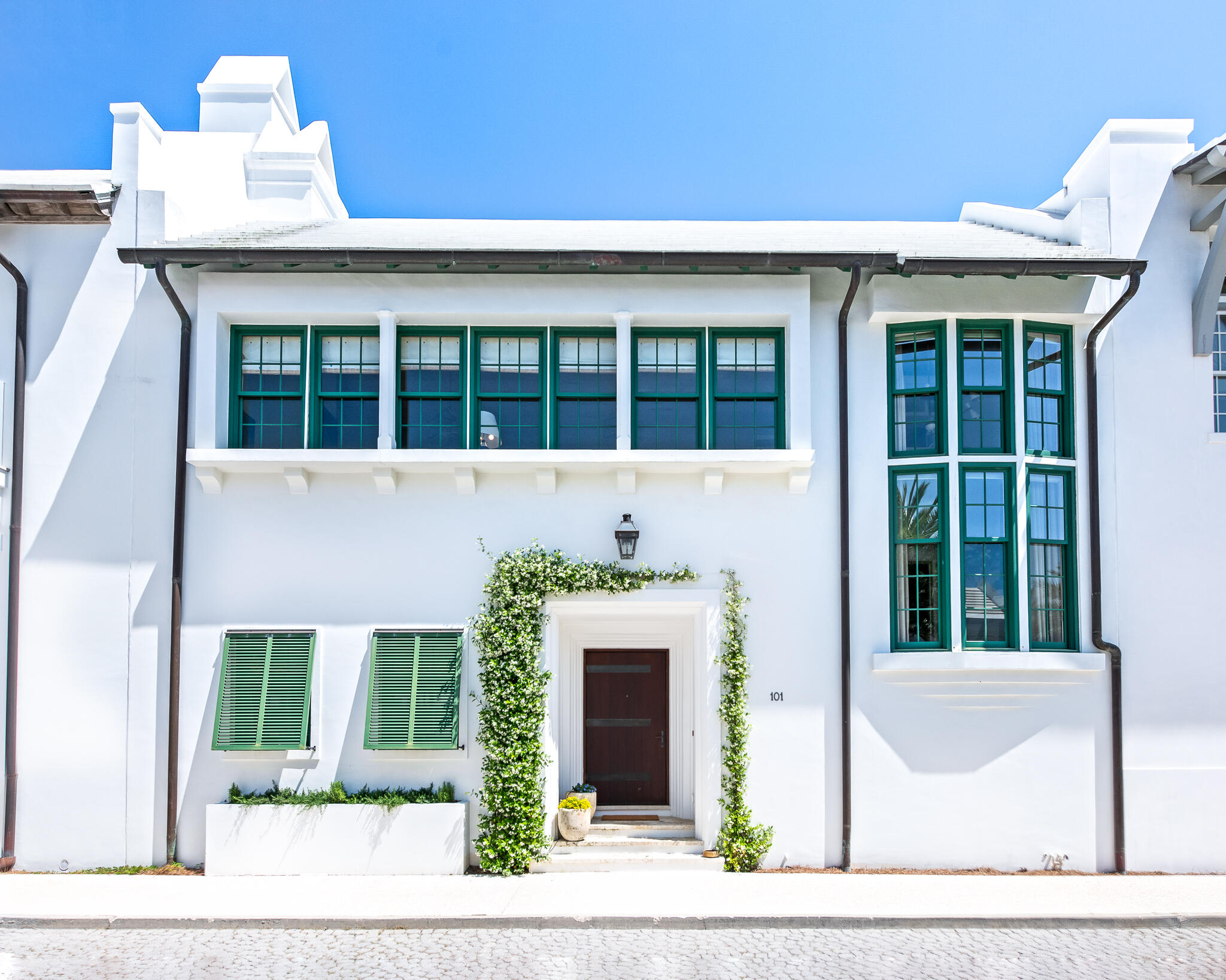 101 Charles Street Inlet Beach, FL 32461 - Photo 1 of 59 a front view of a house with a garden and entryway