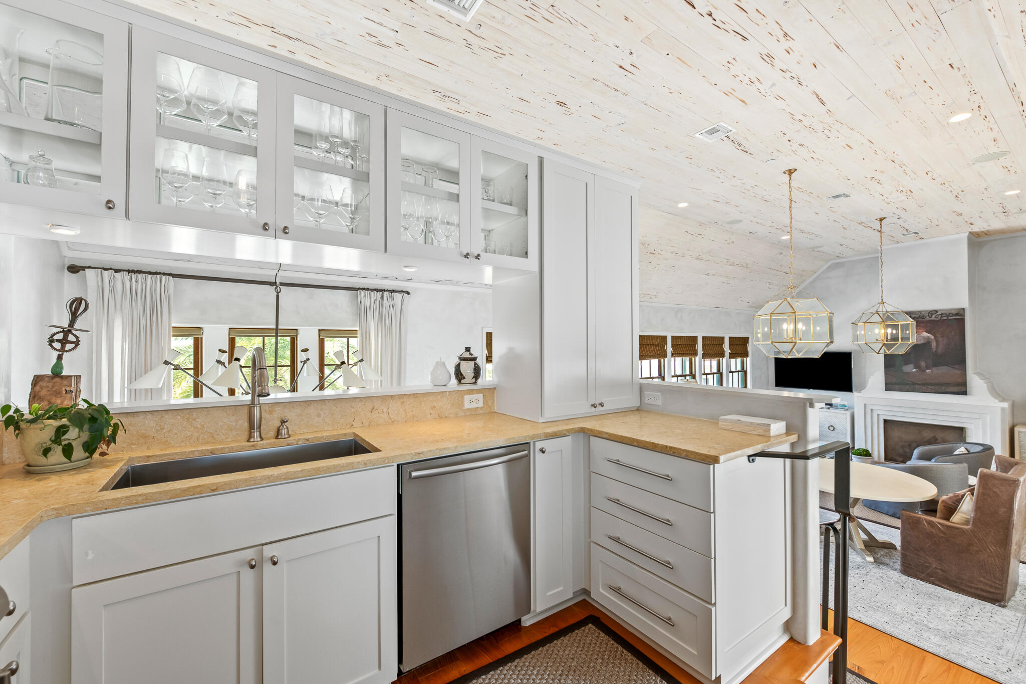 101 Charles Street Inlet Beach, FL 32461 - Photo 14 of 59 a kitchen that has a lot of cabinets in it and appliances