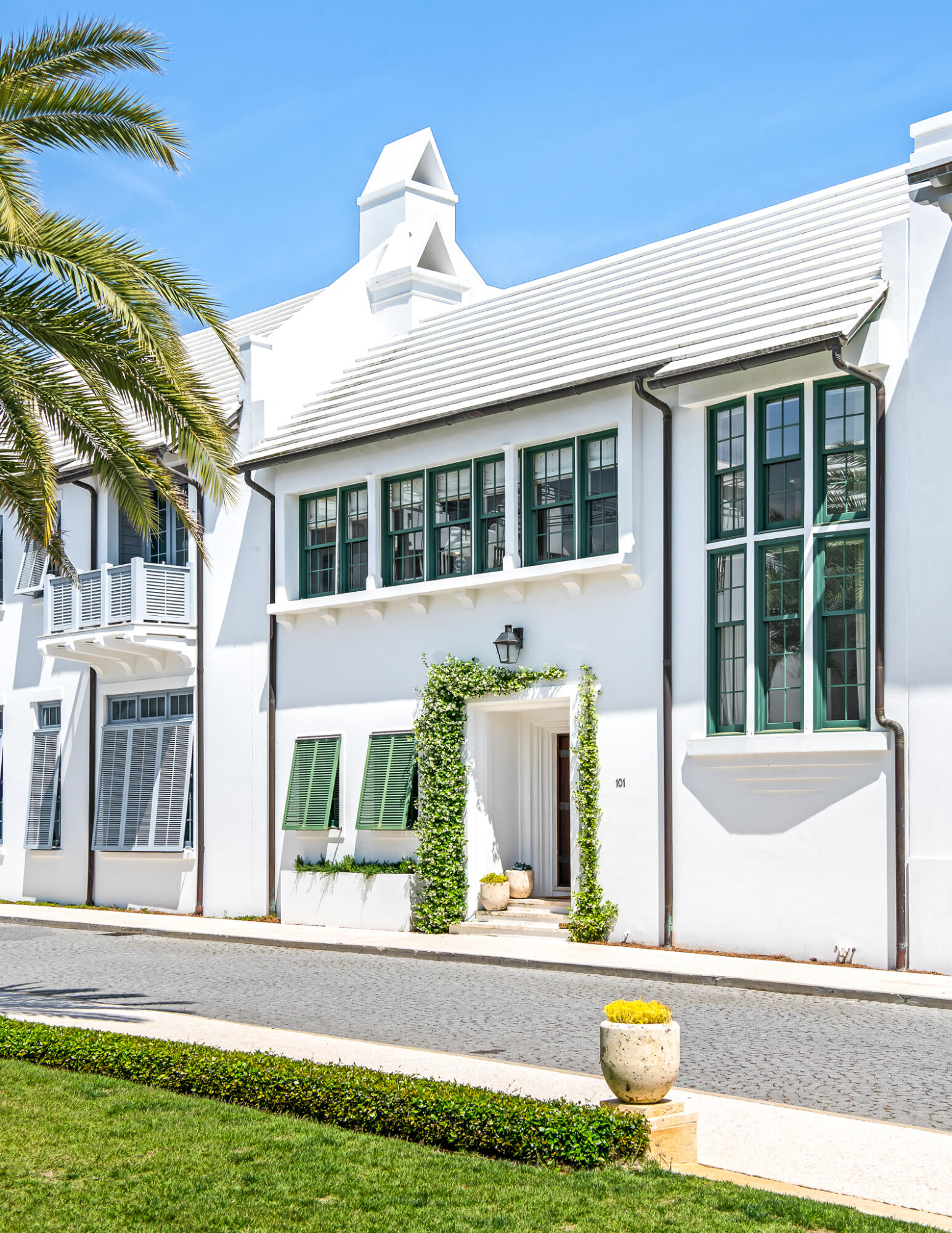 101 Charles Street Inlet Beach, FL 32461 - Photo 3 of 59 a front view of a house with a garden