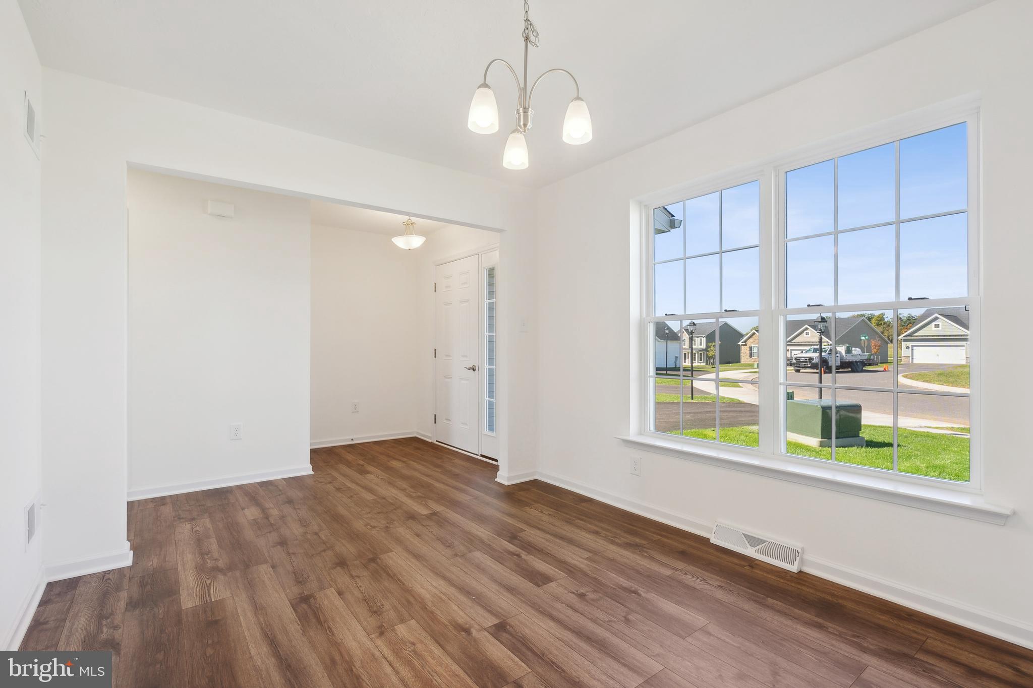 540 Ripple Drive, Unit 47 Hanover, PA 17331 - Photo 3 of 19 a view of livingroom with furniture wooden floor and window
