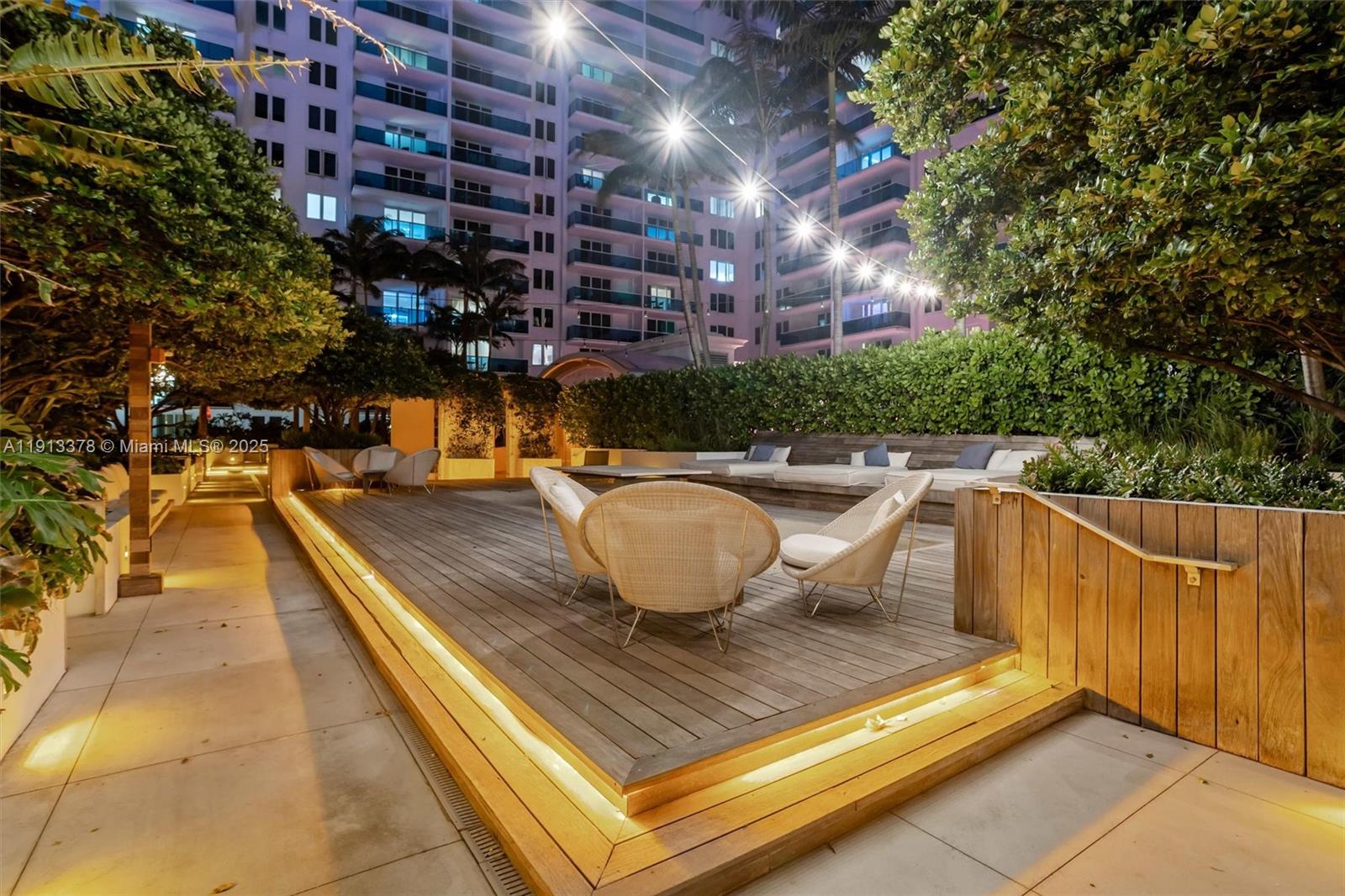 2301 Collins Avenue, Unit 1634 Miami Beach, FL 33139 - Photo 11 of 56 a view of a swimming pool with a patio