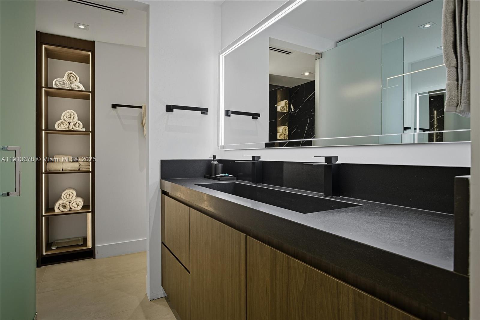 2301 Collins Avenue, Unit 1634 Miami Beach, FL 33139 - Photo 34 of 56 a view with granite countertop a sink and a stove