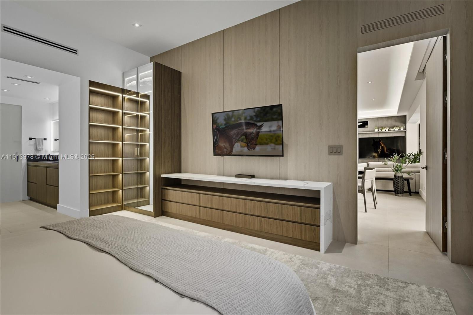 2301 Collins Avenue, Unit 1634 Miami Beach, FL 33139 - Photo 35 of 56 a spacious bedroom with a bed and a television