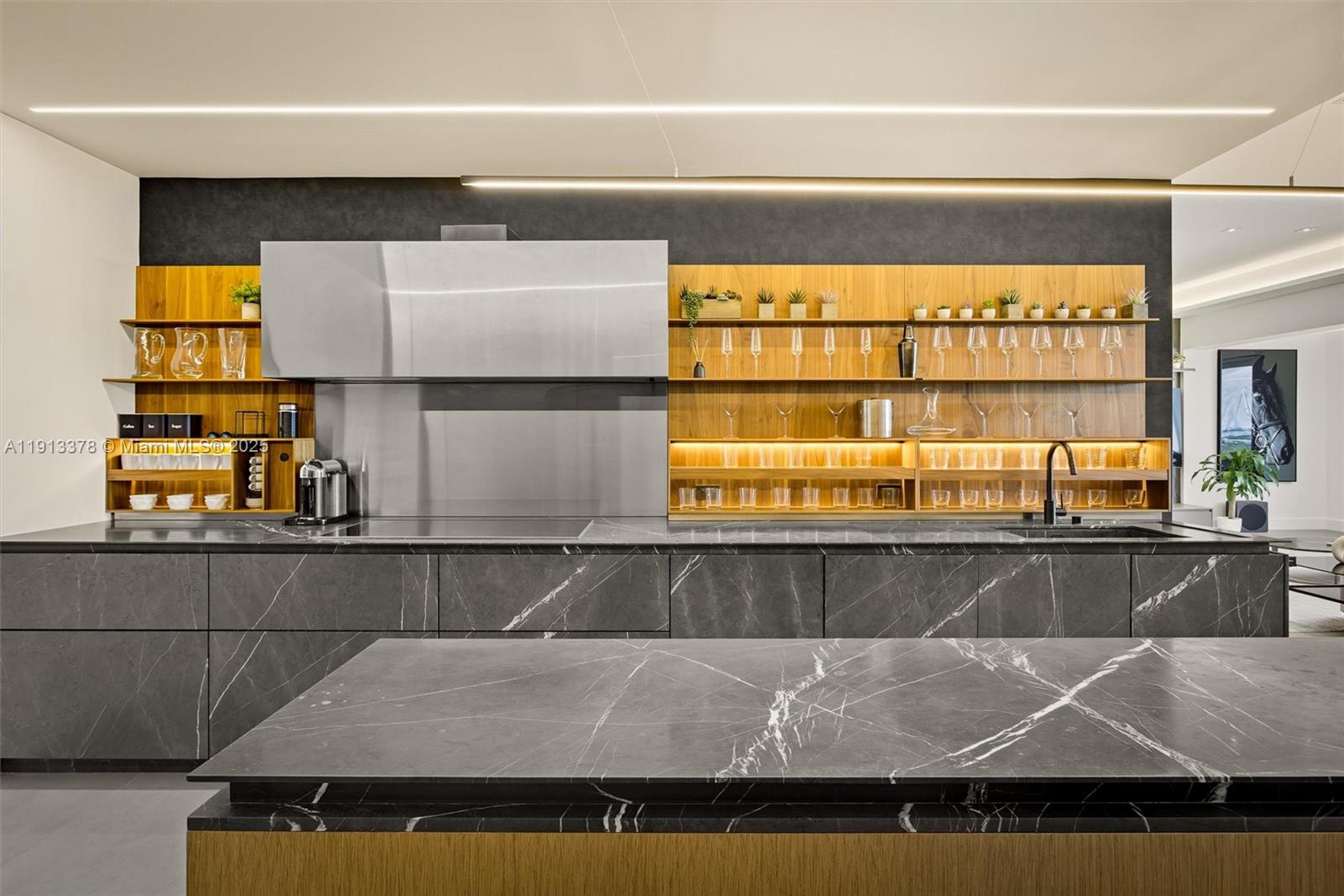 2301 Collins Avenue, Unit 1634 Miami Beach, FL 33139 - Photo 43 of 56 a kitchen with a sink and a window