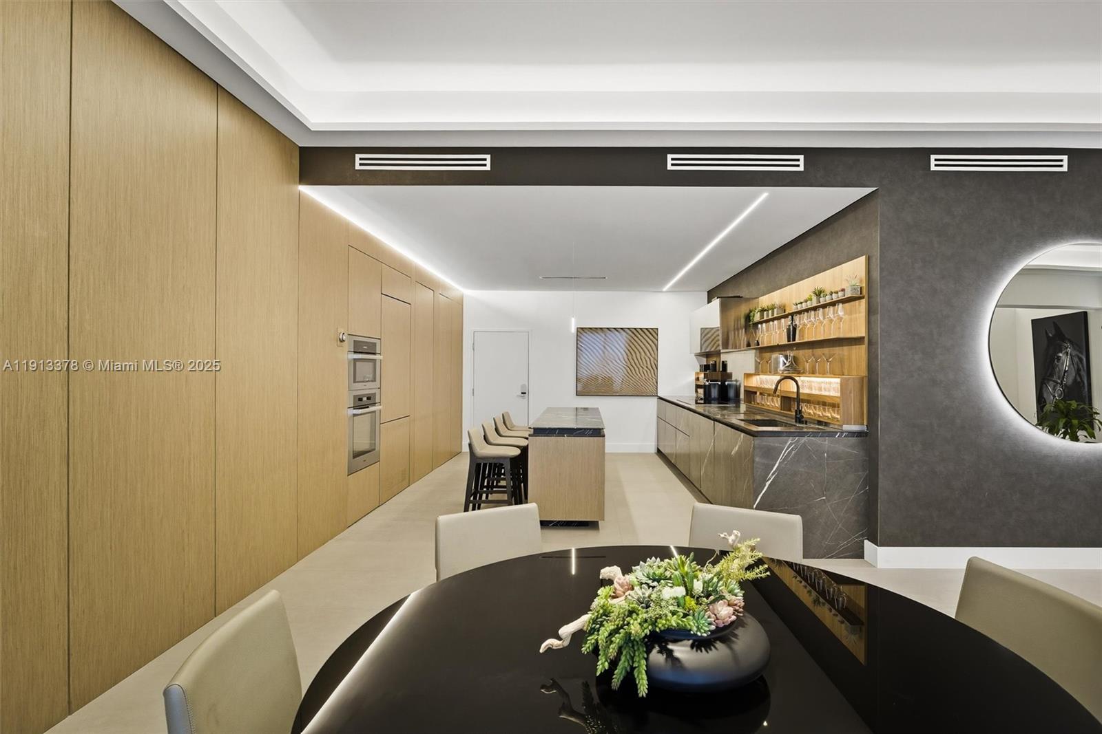 2301 Collins Avenue, Unit 1634 Miami Beach, FL 33139 - Photo 50 of 56 a living room with furniture and a large window