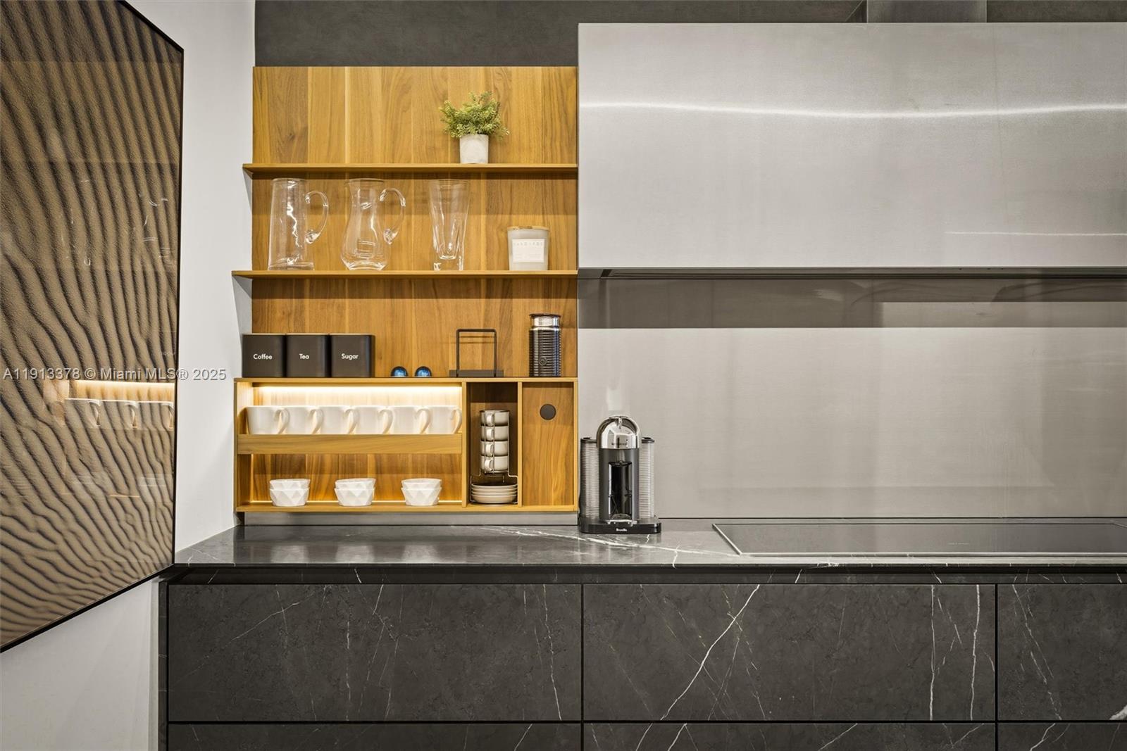 2301 Collins Avenue, Unit 1634 Miami Beach, FL 33139 - Photo 52 of 56 a kitchen with a sink and a window