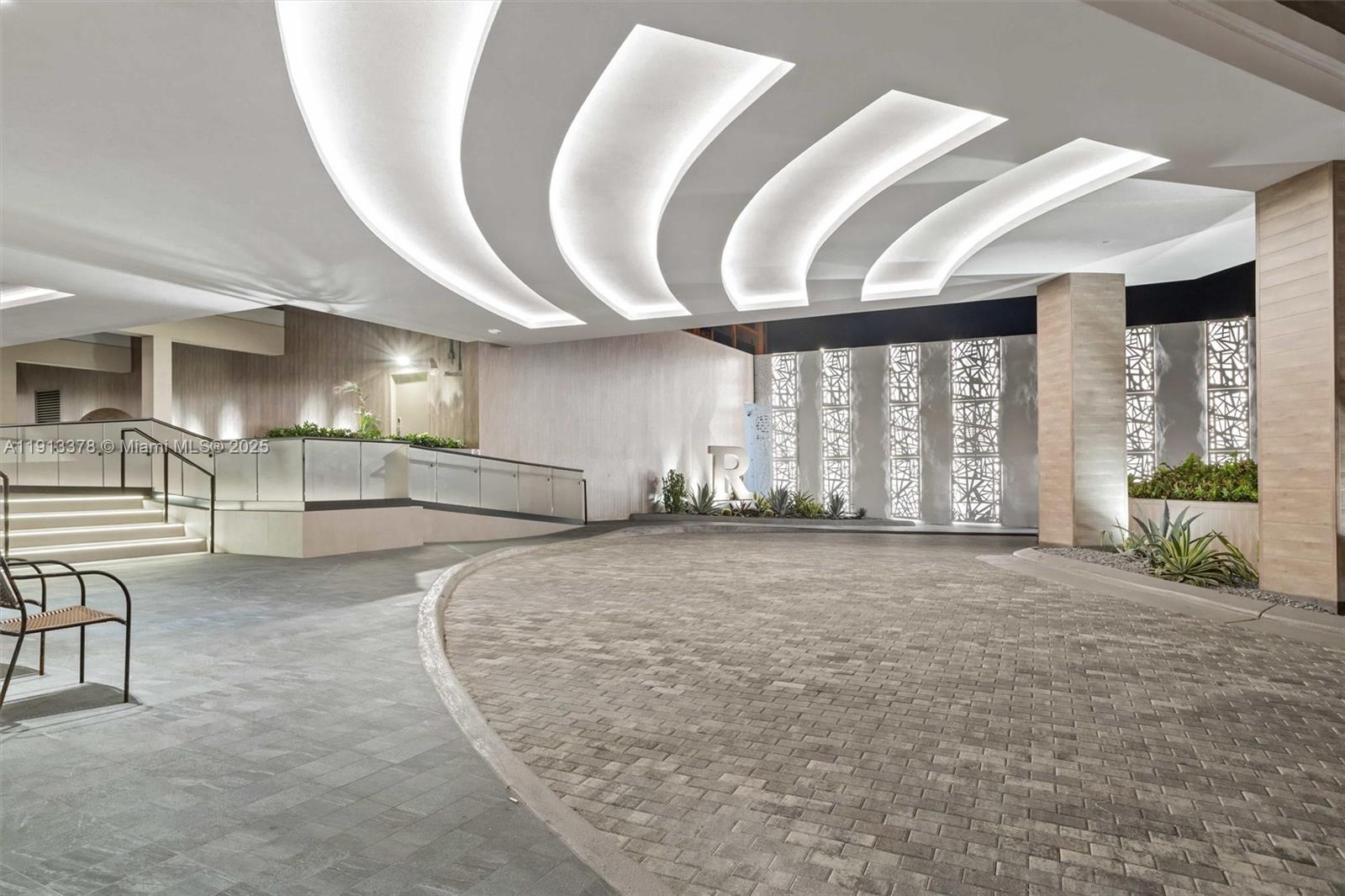 2301 Collins Avenue, Unit 1634 Miami Beach, FL 33139 - Photo 9 of 56 a spacious bathroom with a large mirror and a large window