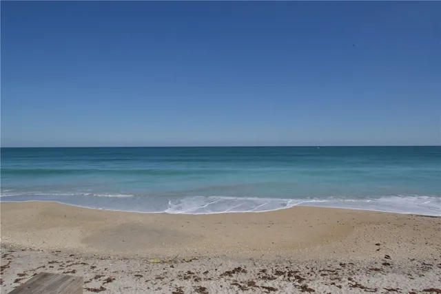 a kitchen with stainless steel appliances a refrigerator sink and cabinets