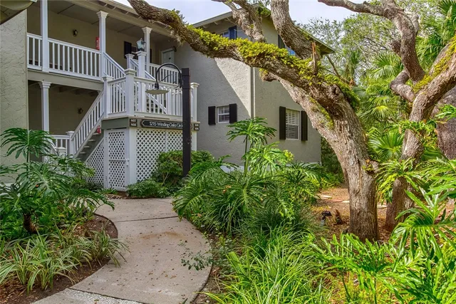 a bedroom with bed and window