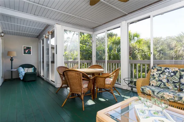 an aerial view of a house with a lake view