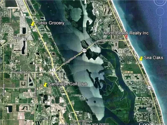 a view of a swimming pool from a balcony