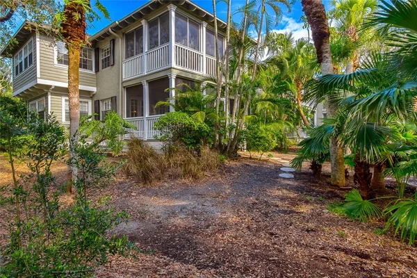 a dining room with furniture window and outside view
