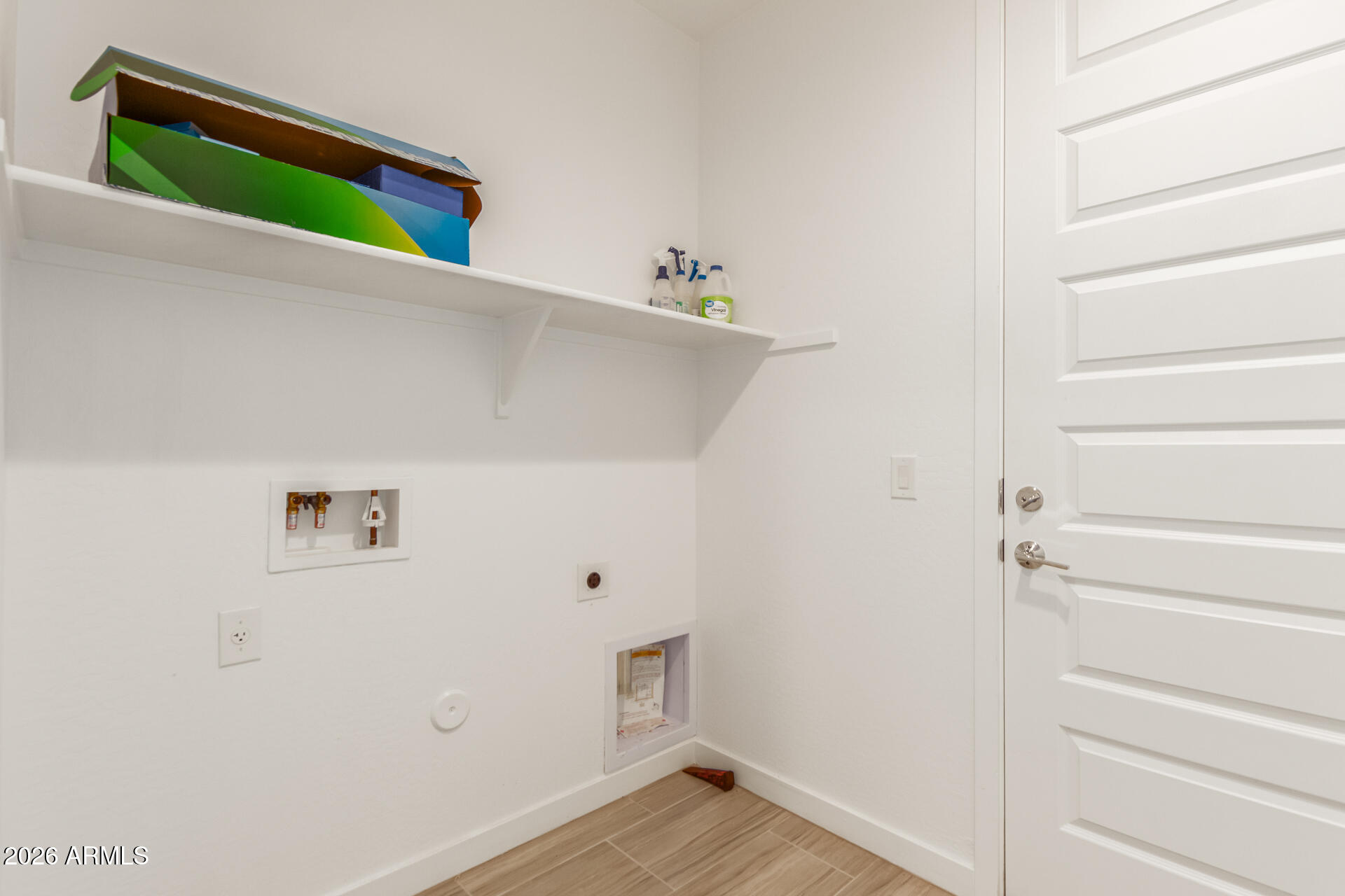 9210 West Roma Avenue Phoenix, AZ 85037 - Photo 19 of 23 Laundry Room