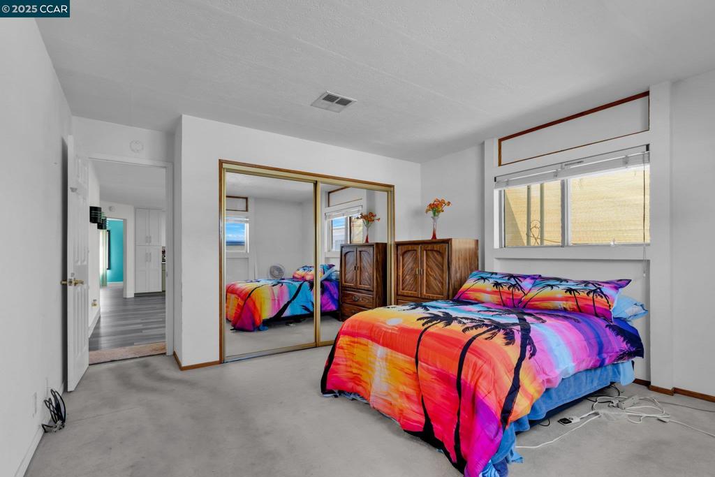 2113 Dalis Drive Concord, CA 94520 - Photo 12 of 22 a bedroom with a bed and window