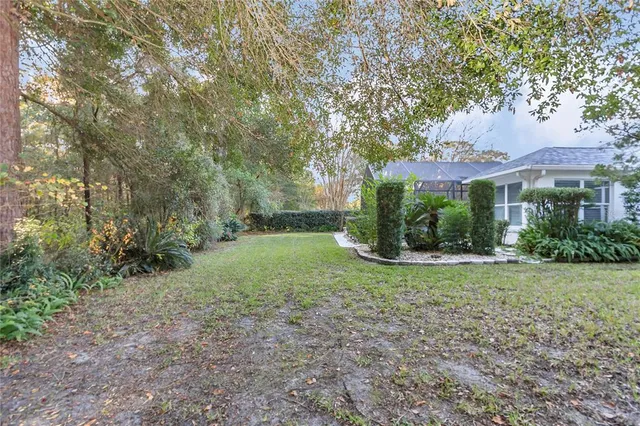 an aerial view of residential house with outdoor space