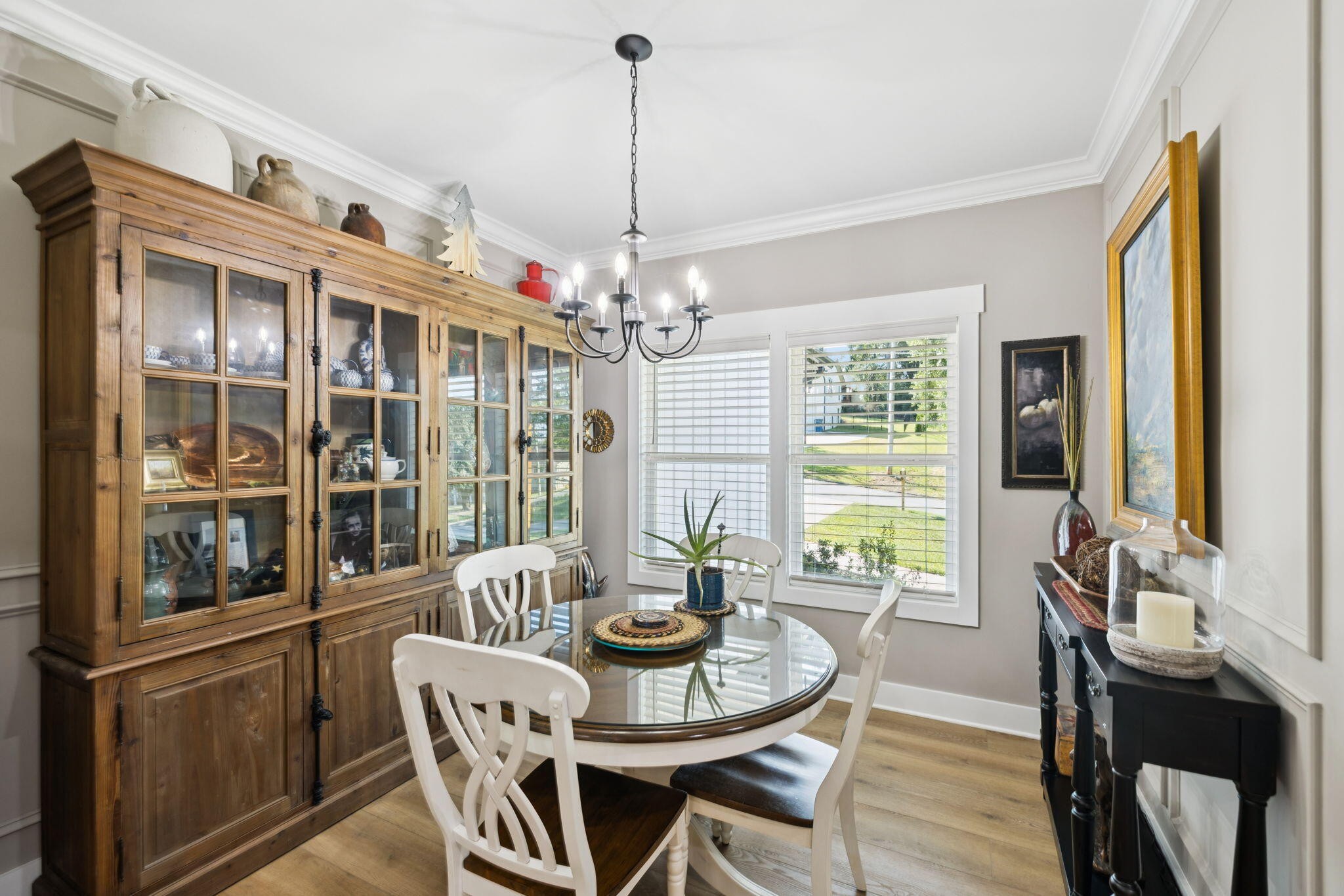 75 Battleview Drive Ringgold, GA 30736 - Photo 12 of 58 a dining room with furniture a chandelier and wooden floor