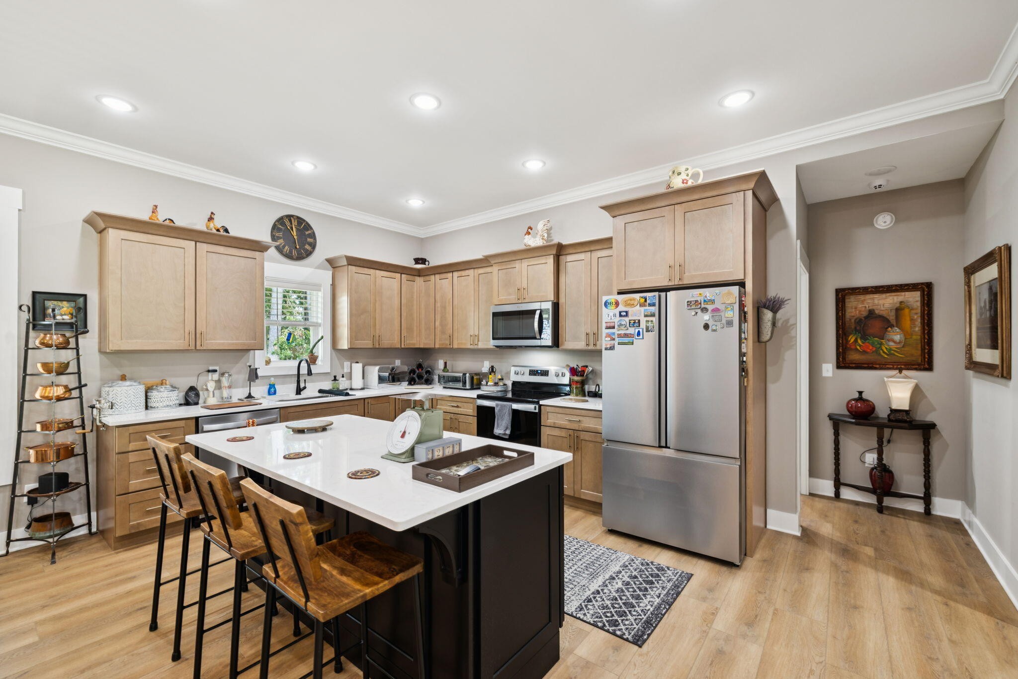 75 Battleview Drive Ringgold, GA 30736 - Photo 14 of 58 a kitchen with a refrigerator a stove a sink dishwasher with a dining table and chairs