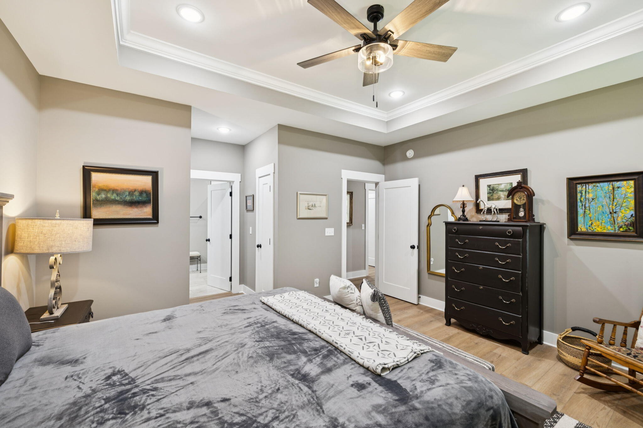 75 Battleview Drive Ringgold, GA 30736 - Photo 19 of 58 a bedroom with a bed and a chandelier