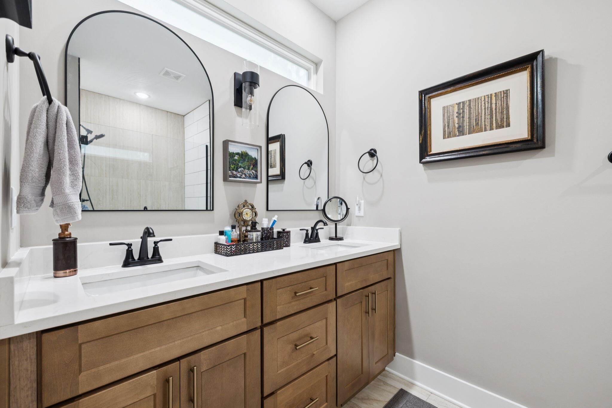 75 Battleview Drive Ringgold, GA 30736 - Photo 23 of 58 a bathroom with a double vanity sink and a mirror