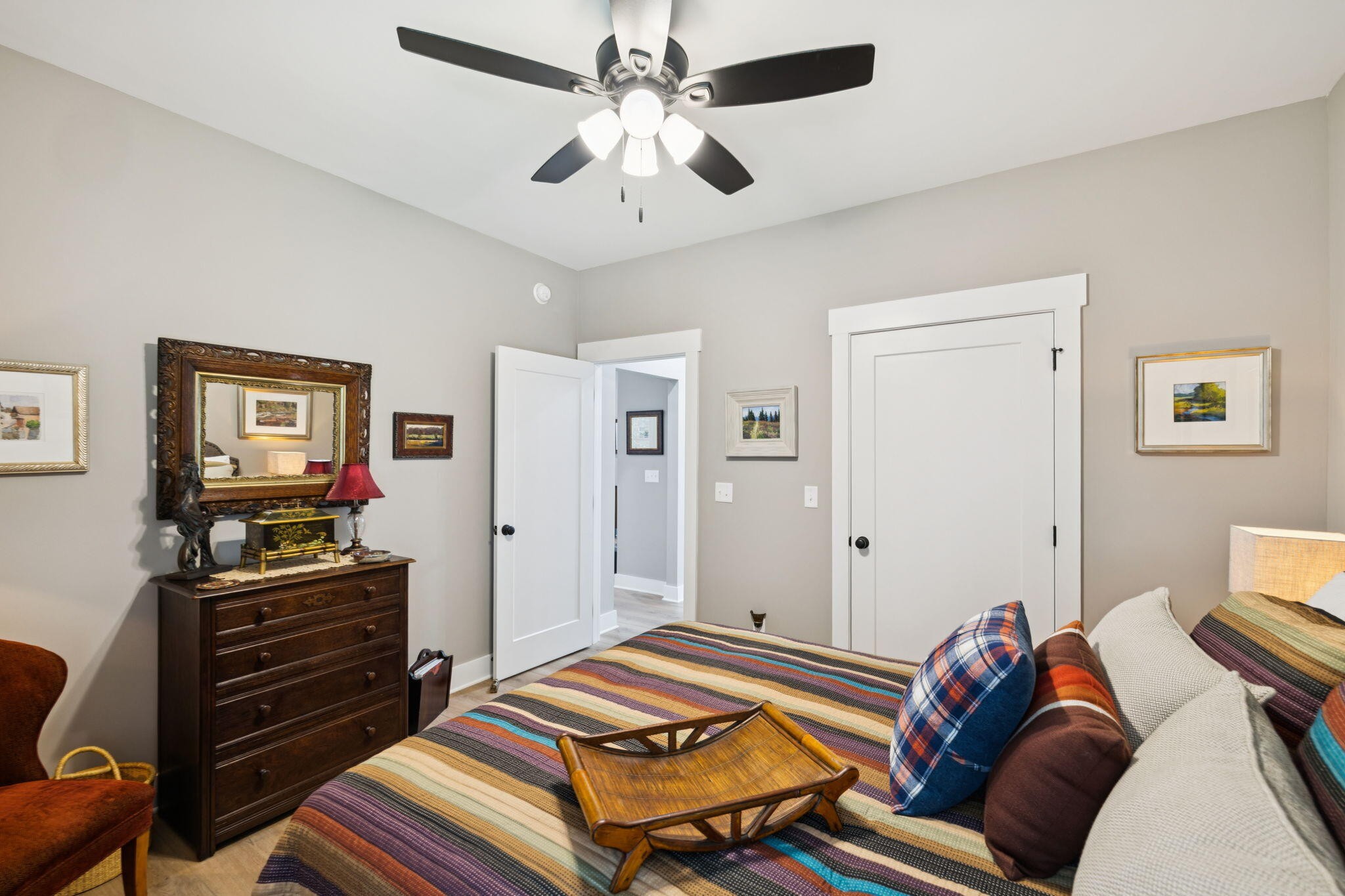 75 Battleview Drive Ringgold, GA 30736 - Photo 28 of 58 a bedroom with a bed and a chandelier