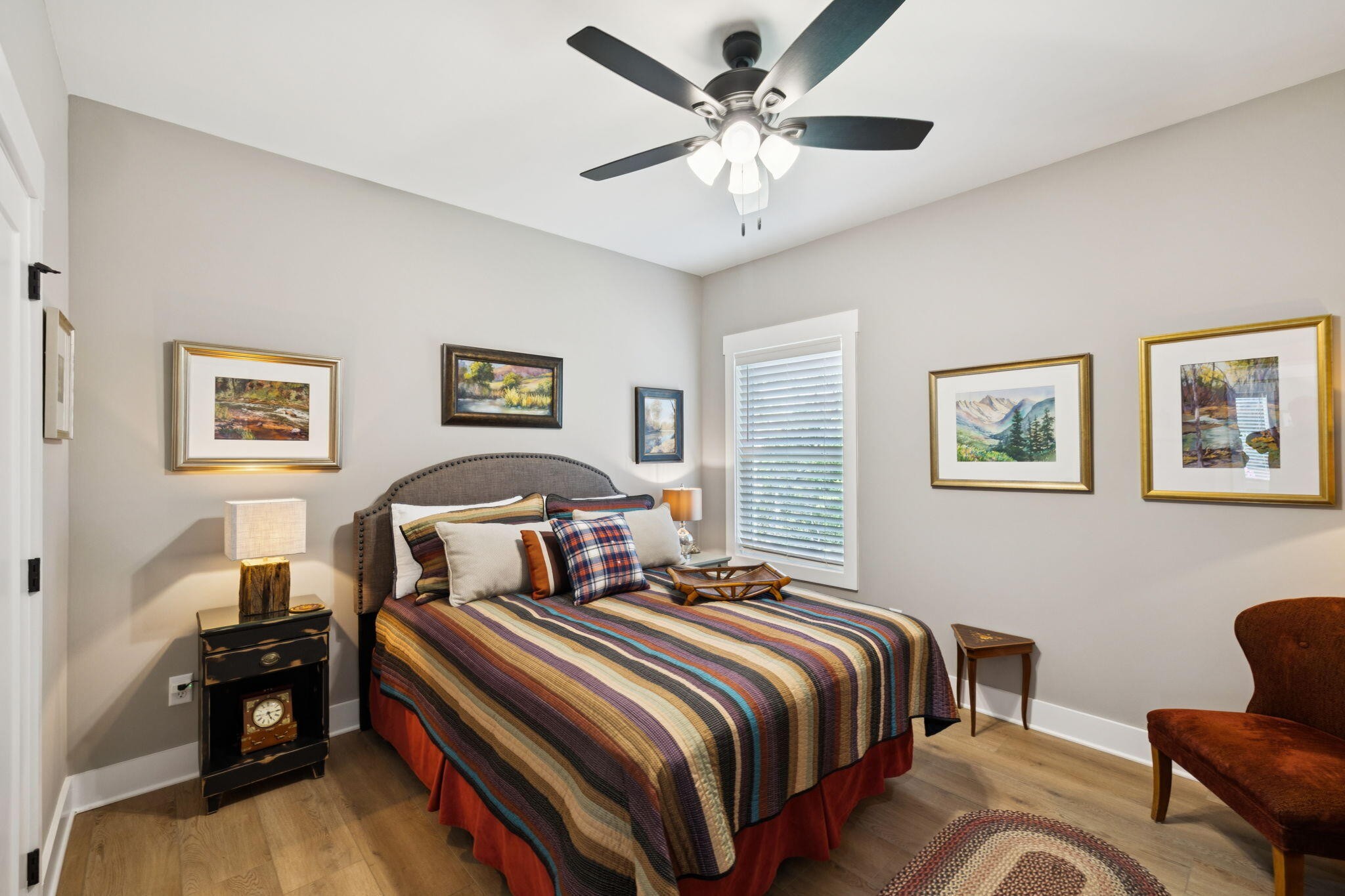 75 Battleview Drive Ringgold, GA 30736 - Photo 29 of 58 a bedroom with a bed and a chandelier